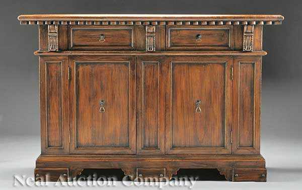 Appraisal: A Carved Walnut Credenza of Italian Renaissance inspiration rectangular top