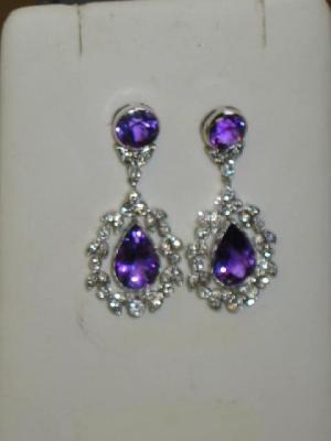 Appraisal: A PAIR OF AMETHYST AND DIAMOND DROP EARRINGS comprising amethyst