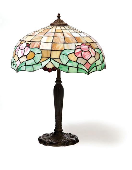 Appraisal: MILLER TABLE LAMP Bronze embossed floral decorated base with slag