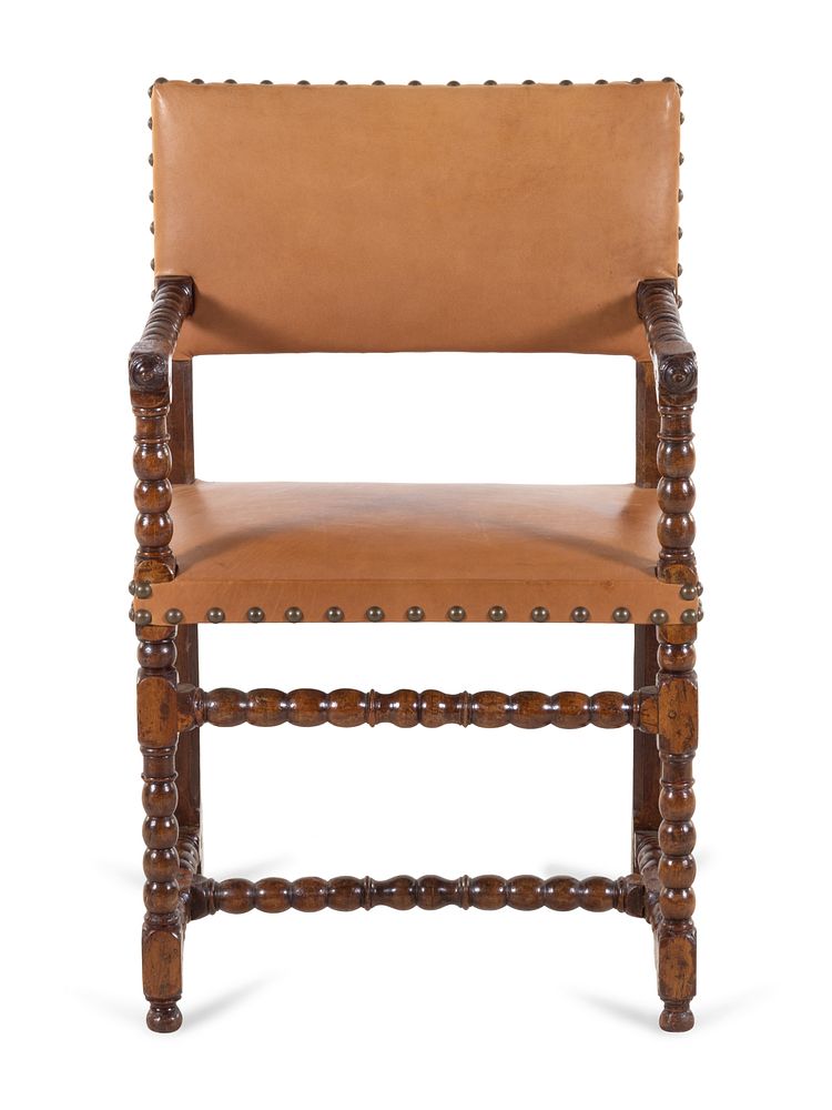 Appraisal: A Spanish Turned Walnut Armchair A Spanish Turned Walnut Armchair