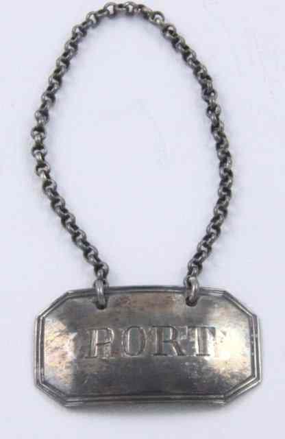 Appraisal: A George III silver decanter label London engraved Port within