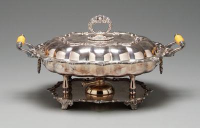 Appraisal: Silver plated entr e dish scroll and shell border platform