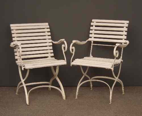 Appraisal: A pair of early th Century white painted iron folding