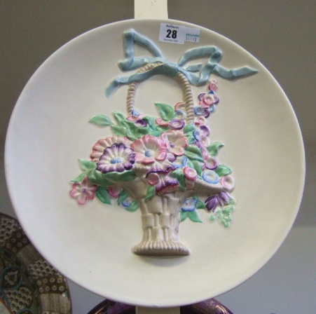 Appraisal: A Clarice Cliff pottery charger relief moulded with a basket