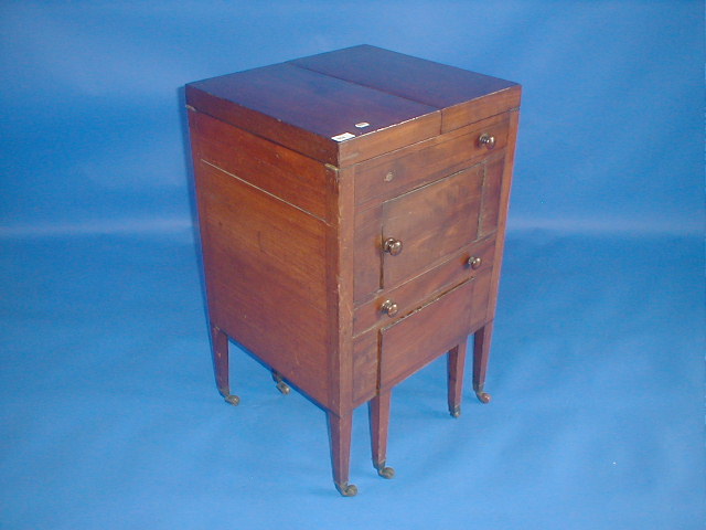 Appraisal: A George III mahogany gentleman's dressing cabinet with later conversions