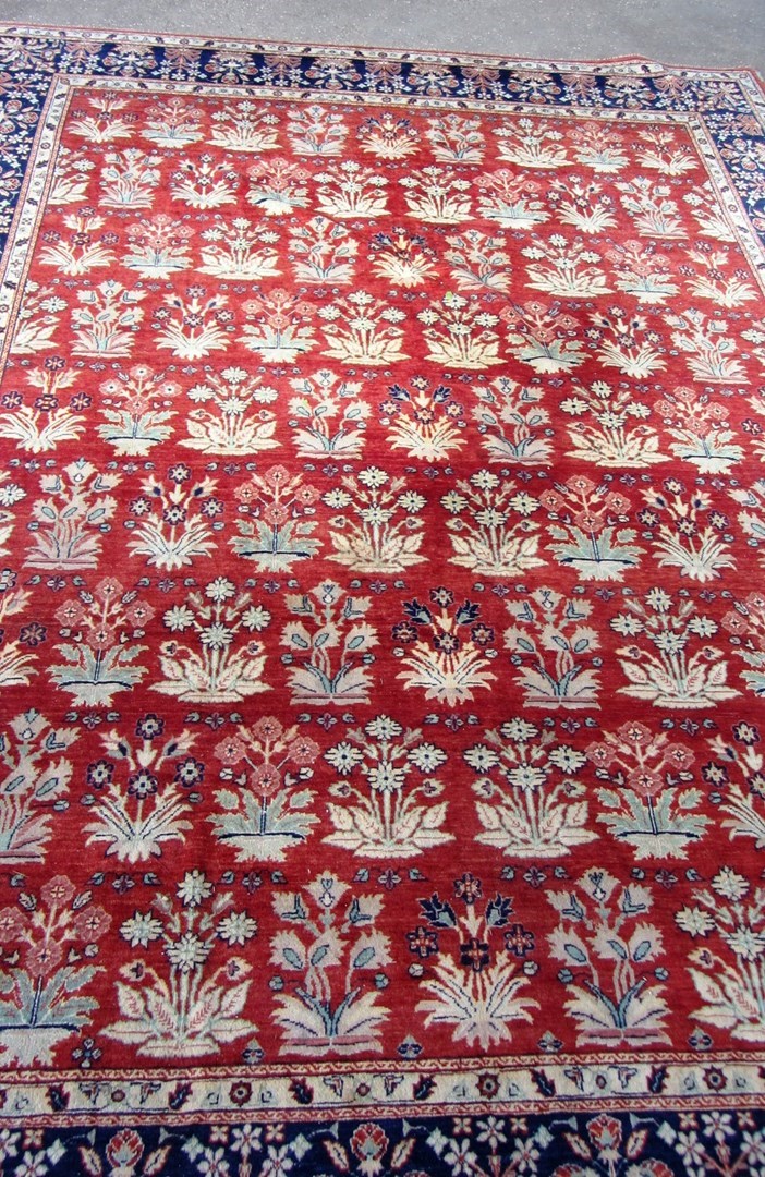 Appraisal: A Mahal style carpet Pakistan modern the iron red field