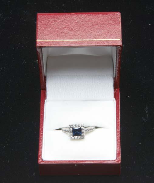 Appraisal: CONTEMPORARY SAPPHIRE RING in k wg with diamonds