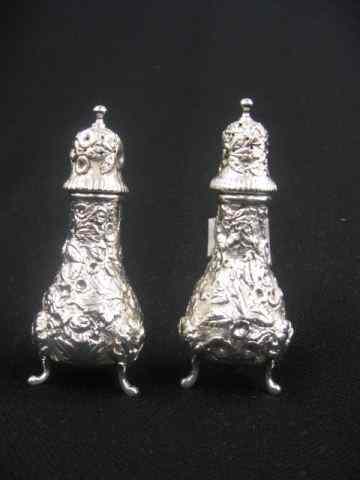 Appraisal: Pair of Repousse Sterling Silver Salt Peppershakers footed circa ''