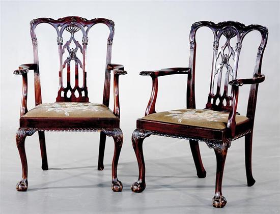 Appraisal: Pair Chippendale style carved mahogany armchairs circa yoked crest over