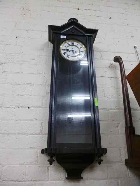 Appraisal: AN EBONISED VIENNA REGULATOR WALL CLOCK the case with turned