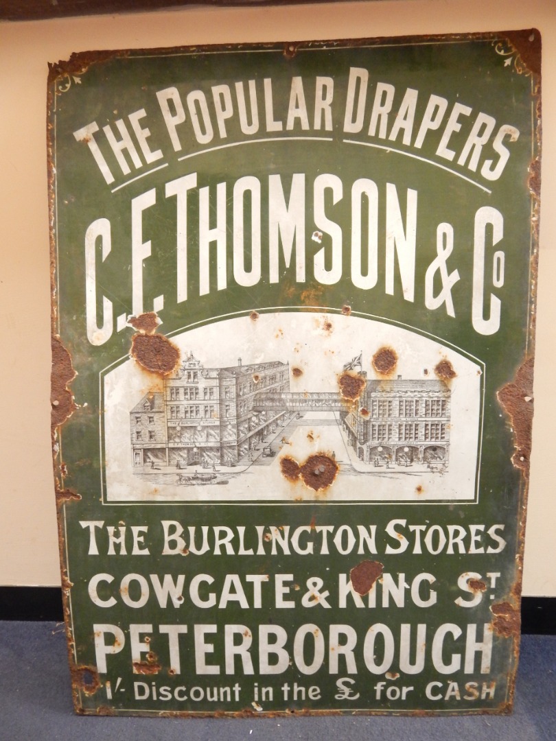 Appraisal: An enamel sign for C E Thomson Co The Popular