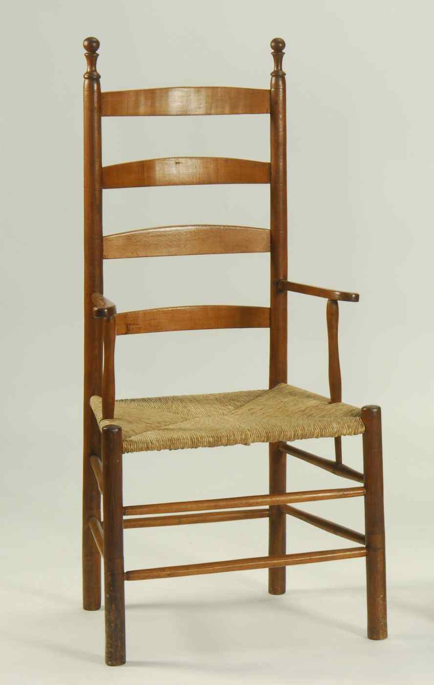 Appraisal: ANTIQUE AMERICAN LADDER-BACK RUSH-SEAT ARMCHAIRLate th Early th CenturyIn maple