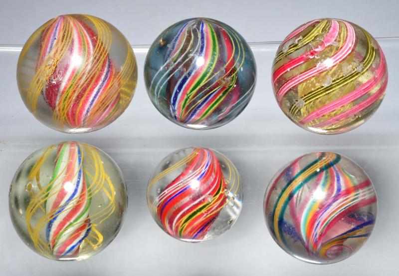 Appraisal: Lot of Swirl Marbles Description Includes one yellow latticino four