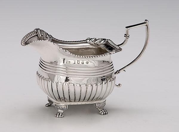 Appraisal: IRISH SILVER CREAMER struck for Dublin and maker James Fry