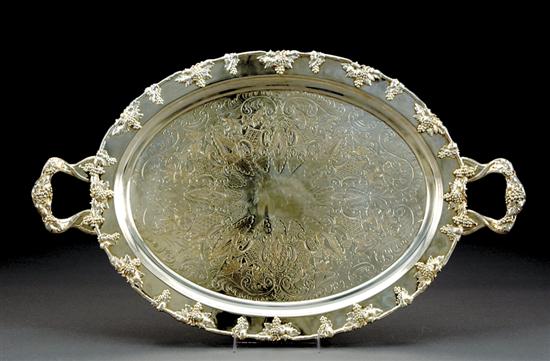 Appraisal: American silverplate footed serving tray scrolling acanthus feet surmounted by