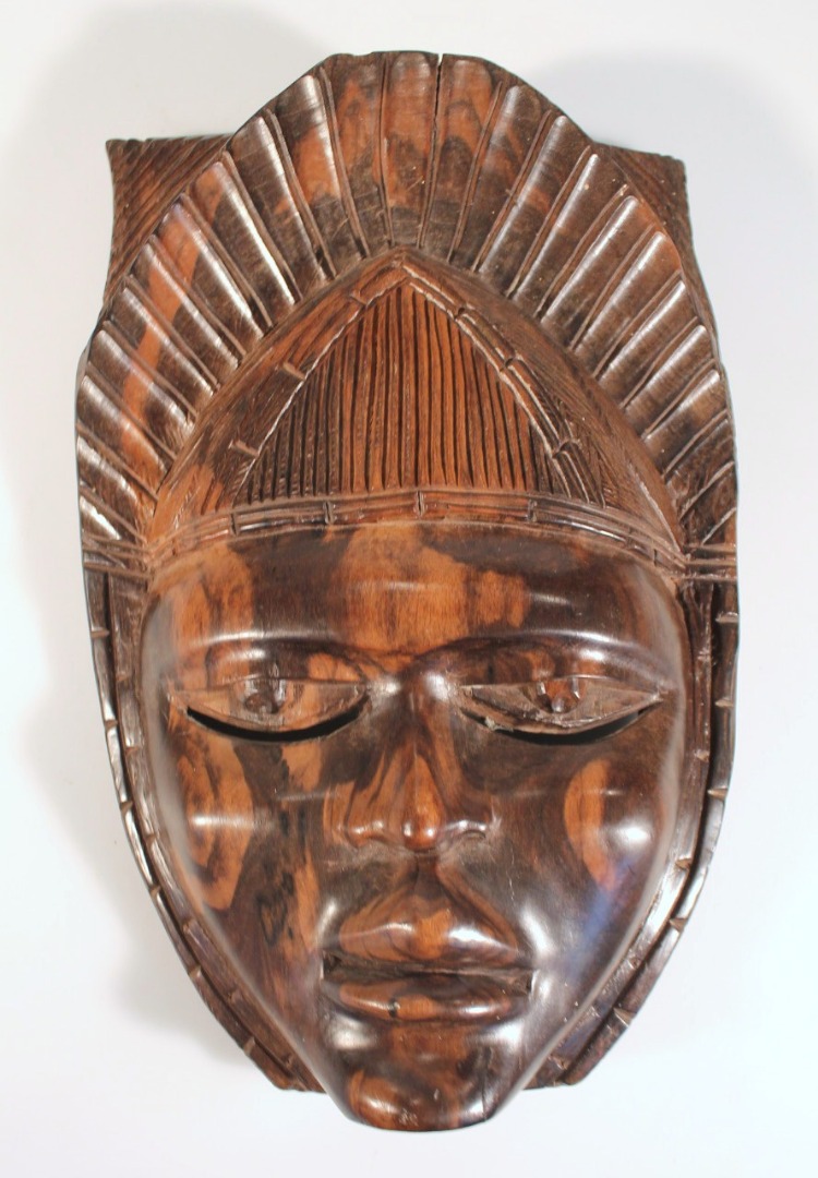 Appraisal: A thC African tribal hardwood face mask carved as a