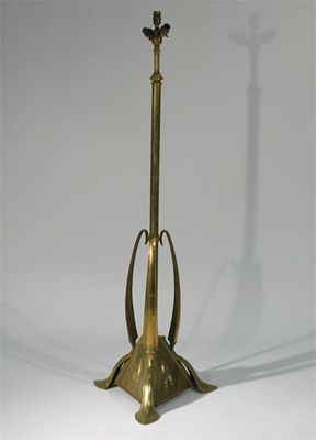 Appraisal: A brass extending standard lamp the tripod foot with simple