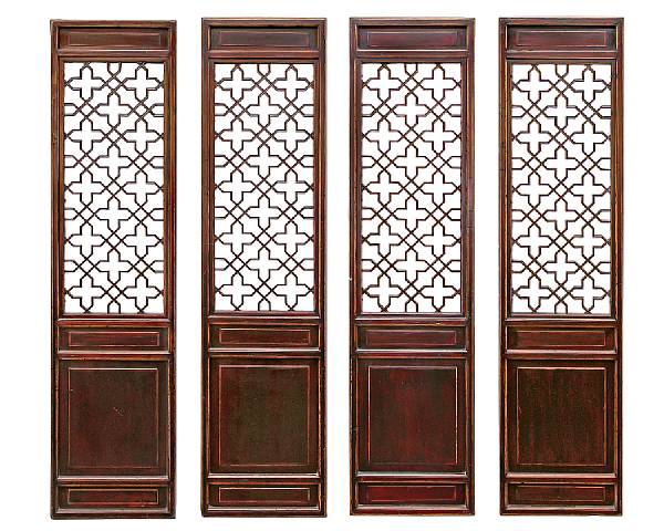 Appraisal: A set of four Chinese carved and lacquered fruitwood panels