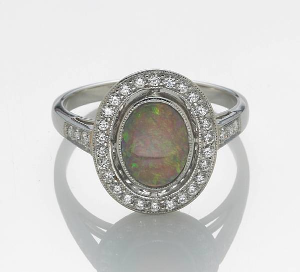 Appraisal: A black opal diamond and platinum ring size