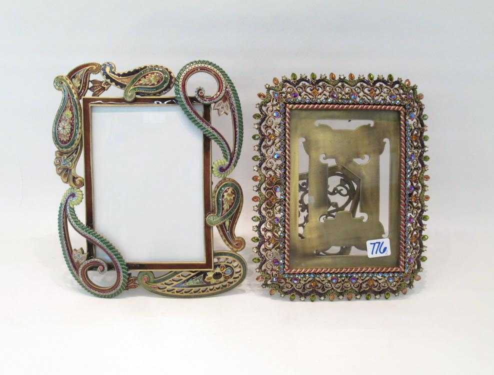 Appraisal: TWO JAY STRONGWATER PICTURE FRAMES of cast metal hand enameled