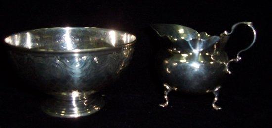 Appraisal: A Victorian sugar bowl with engine turned decoration Sheffield and