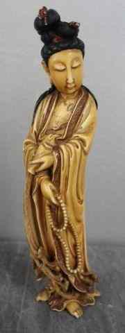 Appraisal: Asian Ivory of a Woman Holding Beads Dyed areas incl