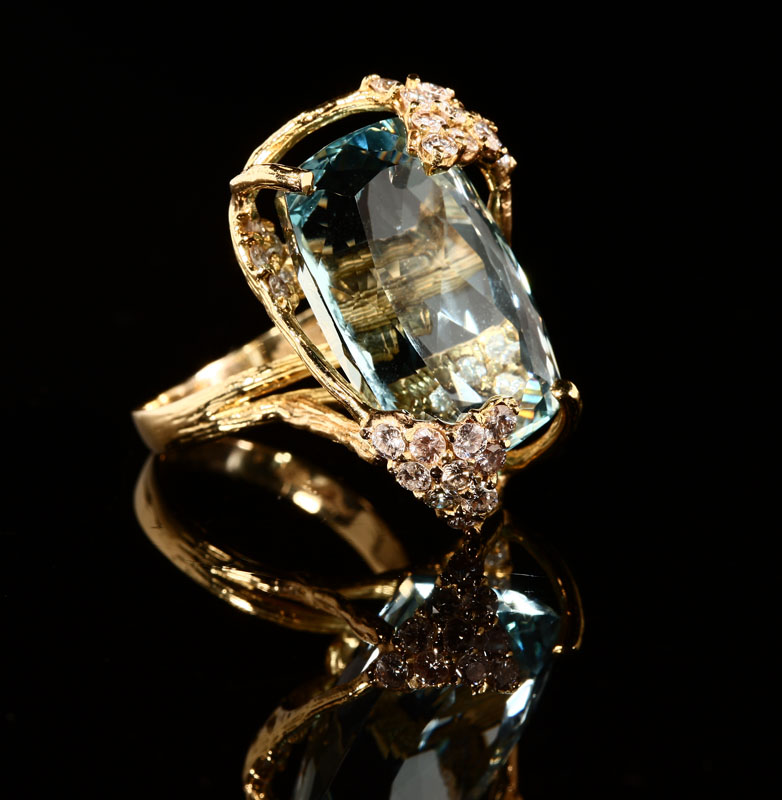 Appraisal: An K yellow gold aquamarine and diamond ring Mounted in