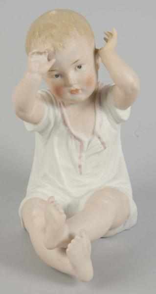 Appraisal: Heubach Bisque Piano Baby Figurine Description Gebr Heubach sunburst stamp