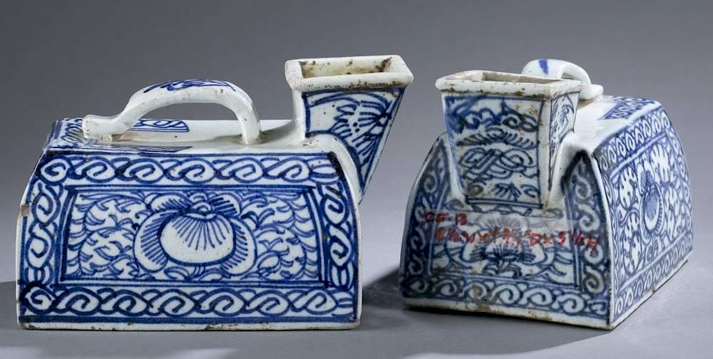 Appraisal: Pair of Chinese blue and white porcelain irons A pair