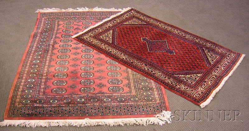 Appraisal: Two Oriental Rugs th century one Seraband ft x ft