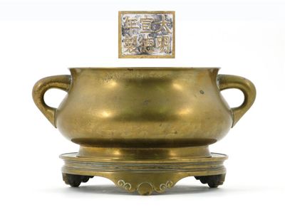 Appraisal: A large Chinese bronze censer and stand with loop handles