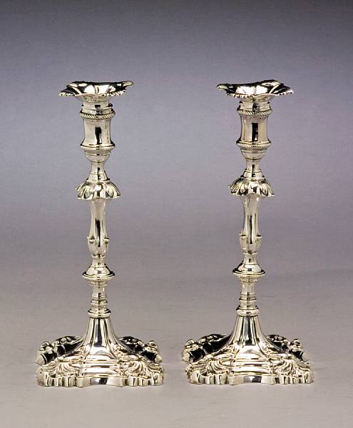 Appraisal: An early George III silver pair of cast candlesticksThomas Hannam