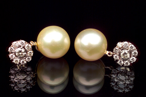 Appraisal: GOLDEN SOUTH SEA PEARL Diamond earrings in k white and