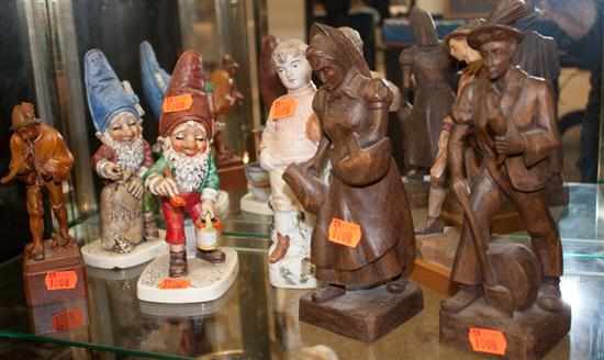 Appraisal: Two Goebel gnome figures four Continental carved wood figures and