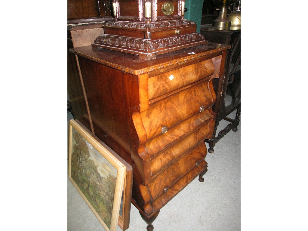 Appraisal: Mahogany ogee chest with replacement oak top