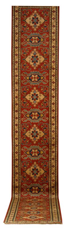 Appraisal: ORIENTAL RUG KAZAK-DESIGN RUNNER ' x ' Repeated traditional elements