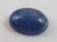 Appraisal: An unmounted cabochon sapphire weight approx carats