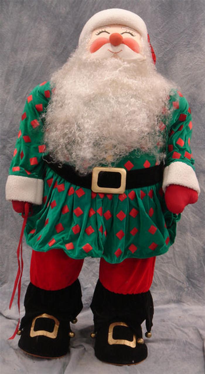 Appraisal: Cloth Santa figure green jacket h Estimate -