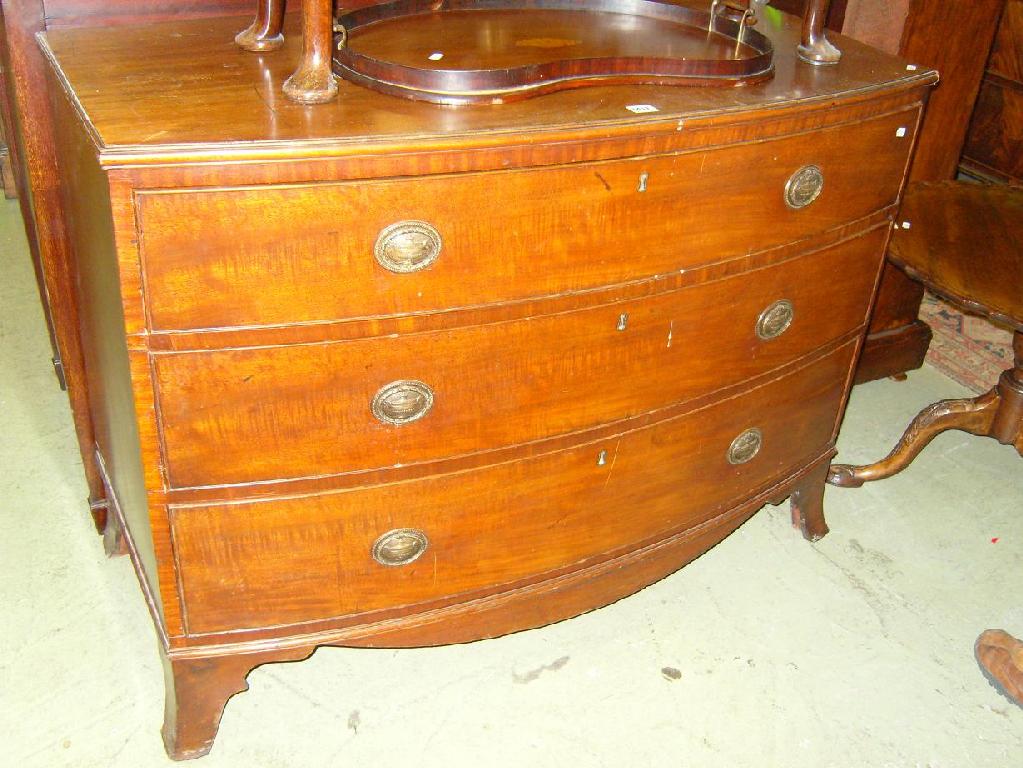 Appraisal: An early th century mahogany bow fronted chest fitted with