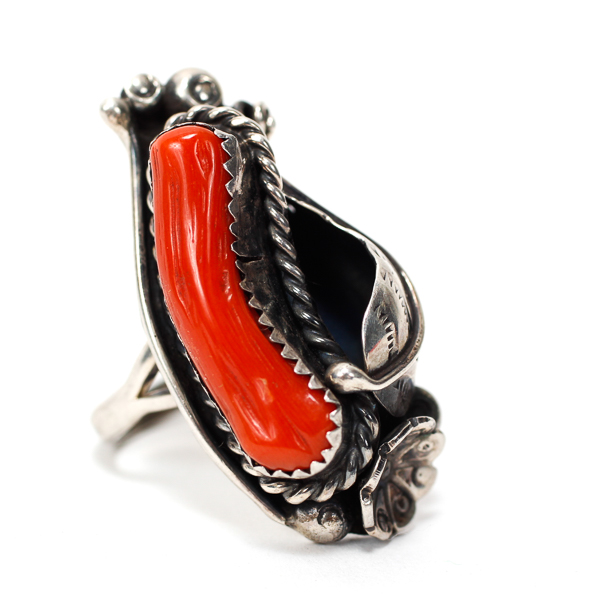 Appraisal: Vintage Native American sterling silver coral ring with feather and