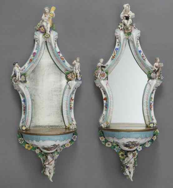 Appraisal: Pr Meissen style porcelain mirrored wall bracketsmounted with musicians and