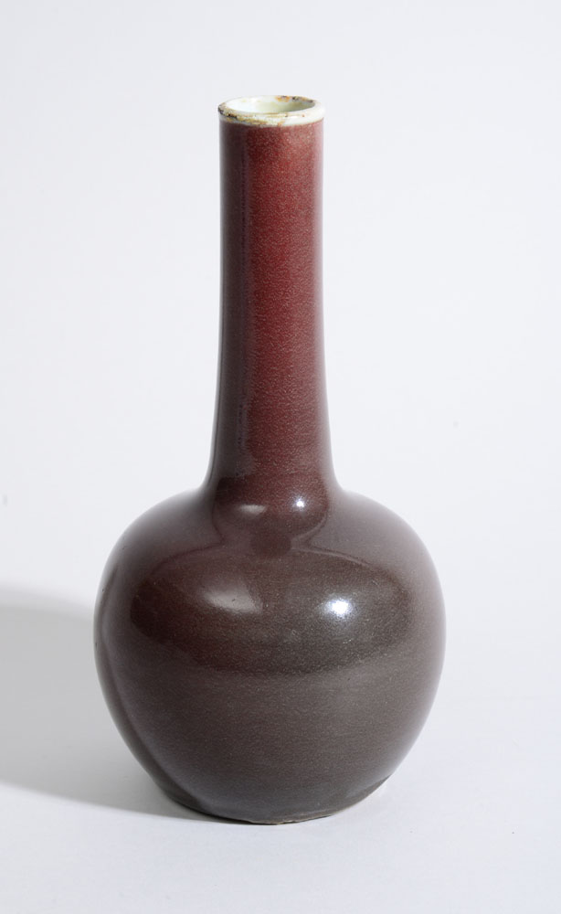 Appraisal: CHINESE OX BLOOD GLAZED PORCELAIN BOTTLE-FORM VASE With incised reign