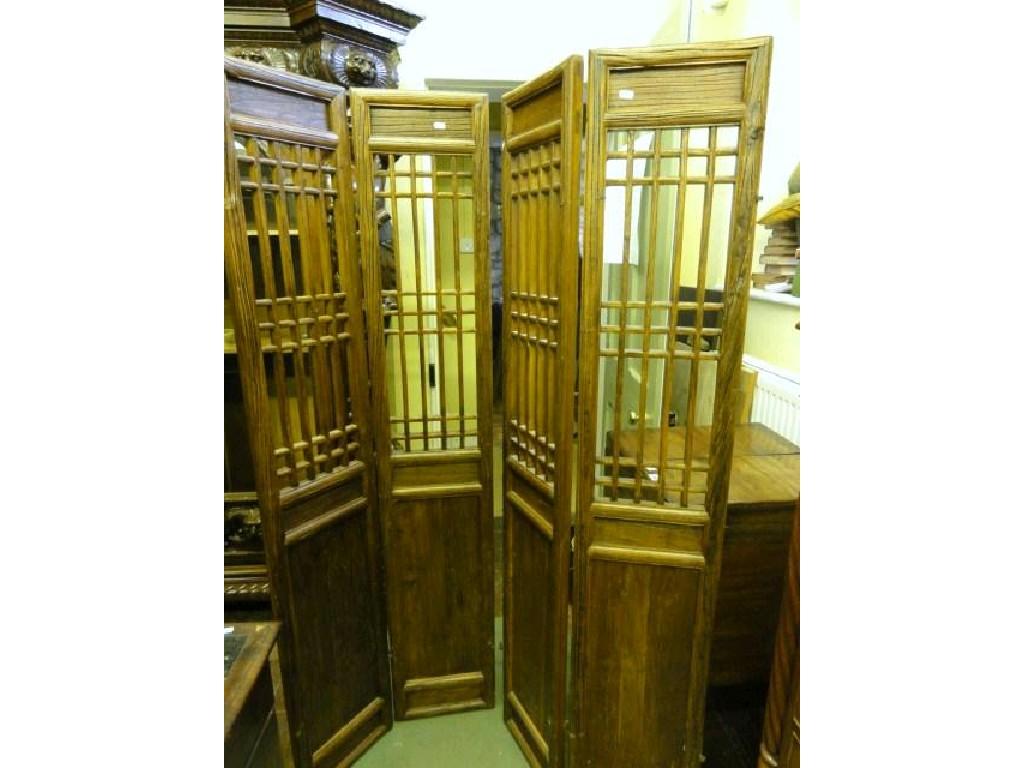 Appraisal: A pair of eastern hardwood two fold screens with segmented