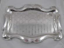 Appraisal: A shaped rectangular silver tray Chester x cm Approx oz