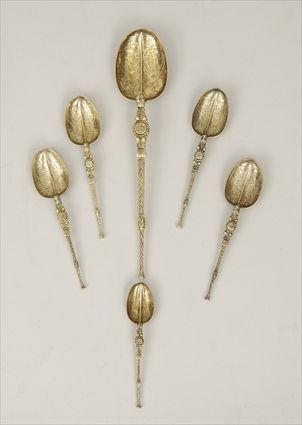 Appraisal: Six English Silver-Gilt Rat Tail Spoons Modern to in approx