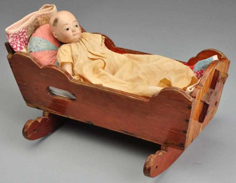 Appraisal: Early Sonneberg Tauffling Description Papier-M ch baby with bald head