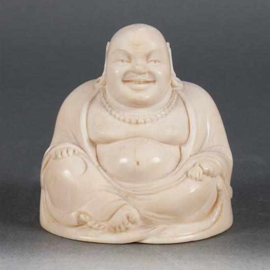 Appraisal: Chinese carved ivory figure of a seated Buddha late th