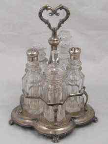 Appraisal: A five bottle Russian silver cruet the frame by Mathias