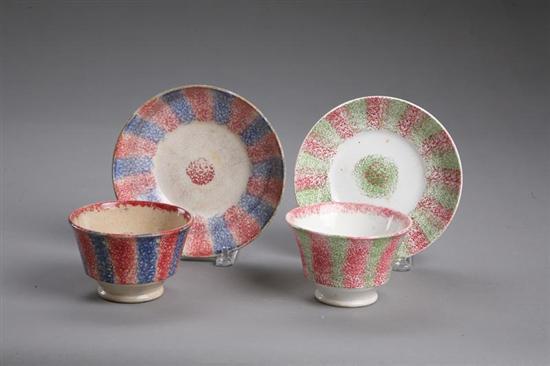 Appraisal: TWO RAINBOW SPATTERWARE HANDLESS CUPS AND SAUCERS English st half-