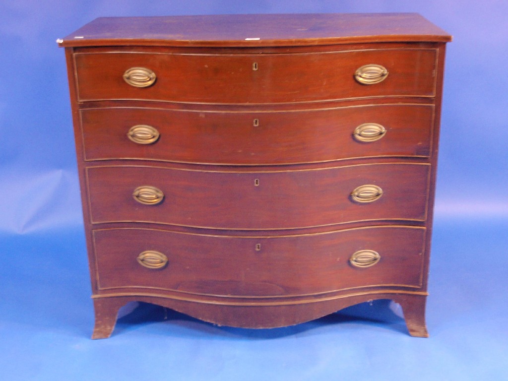 Appraisal: A George III mahogany Serpentine chest of four graduated drawers